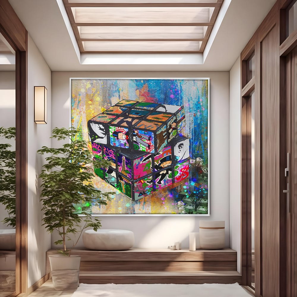 Tablou canvas cu pictura cub rubik cu monopol, in rama de aluminiu argintiu